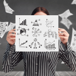 Image of woman holding up a infographic from our data visualization course