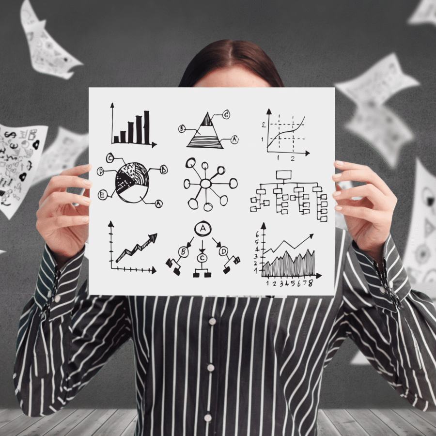 Data analyst showing her sketch for data visualization charts and diagrams